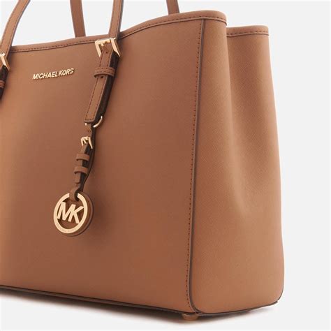 big vs small michael kors jet setter tote|Michael Kors jet set luggage.